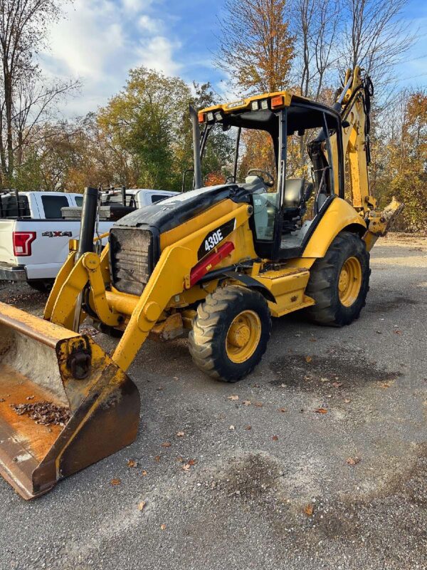 CATERPILLAR 430E backhoe loader for sale, open cab with quick coupler, 54432 hours, front loader