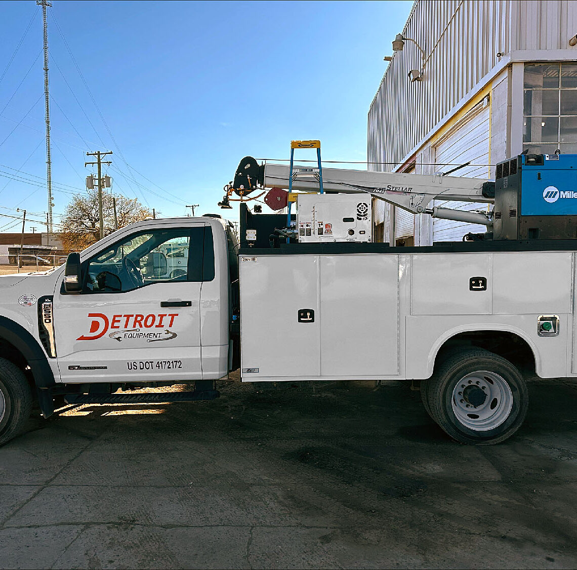 Detroit Equipment electrical contractor services truck driverside