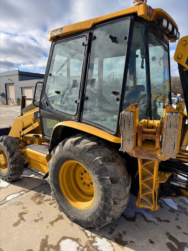 CAT 420D Backhoe For Sale, cab and stabilizer arm